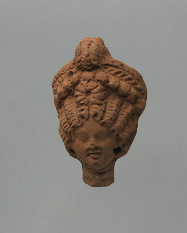 figurine de tête de femme romaine à cou fermé