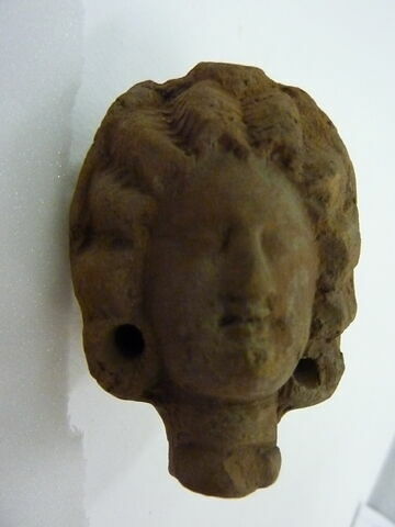 figurine de tête de femme romaine à cou fermé