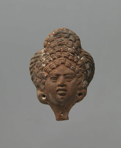 figurine de tête de femme romaine à cou fermé