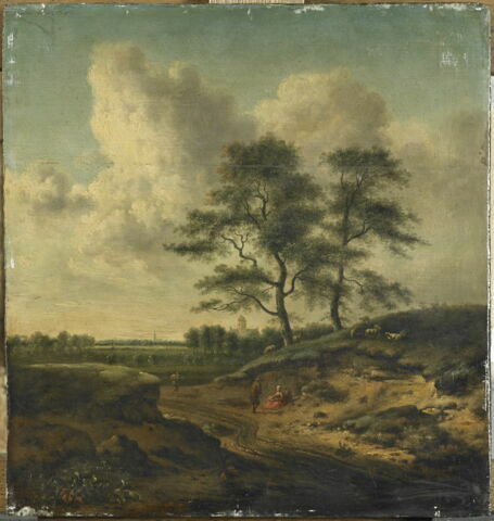 Bergers et moutons au bord d'un chemin