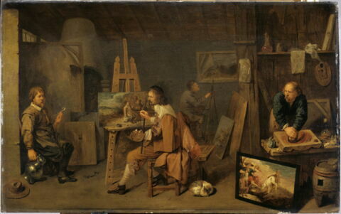 Atelier de peintre avec broyeur de couleurs et modèle en train de poser, image 2/3