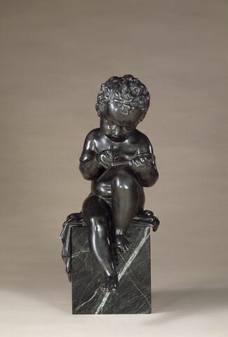 Statuette : Enfant dessinant