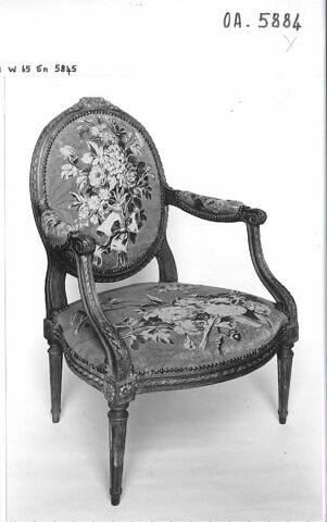 Fauteuil à garniture rapportée