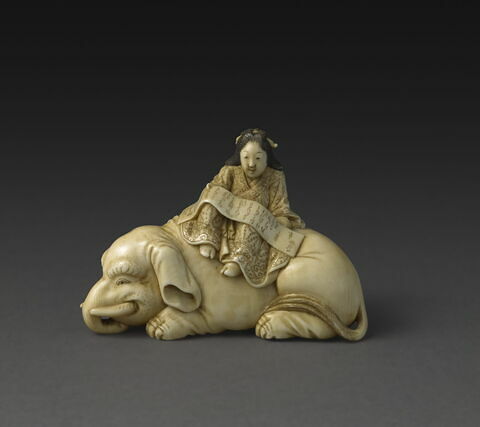 Netsuke : La courtisane Eguchi no kimi représentée en Fugen, le bodhisattva de la Sagesse universelle