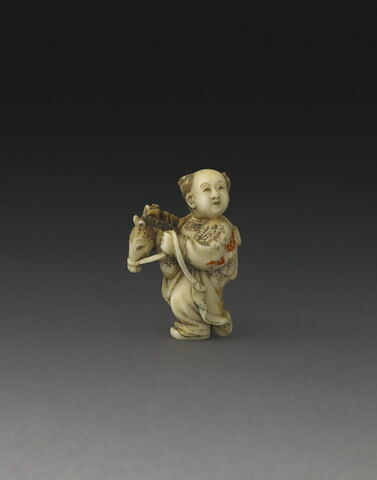 Netsuke : Enfant chinois (krako) sur cheval de bois