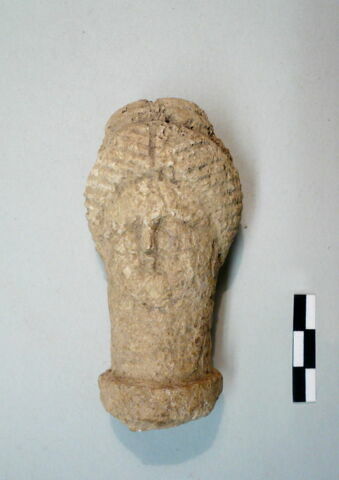 figurine  ; manche d'outil