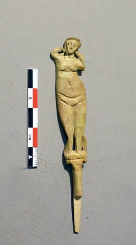 épingle ; tête d'épingle ; figurine