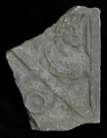 Stèle votive à Saturne (fragment)