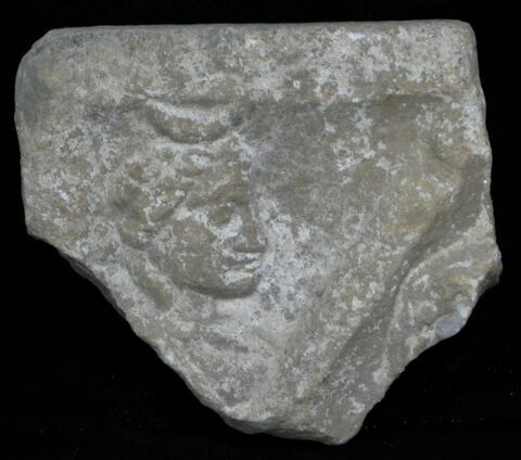 Stèle votive à Saturne (fragment)