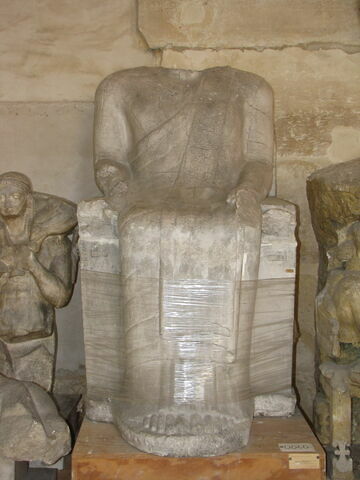 Tirage intégral d’une statue masculine assise