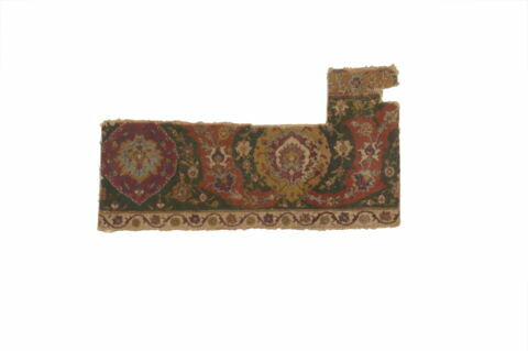 Fragment de bordure de tapis