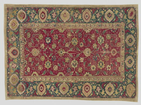 Tapis à rinceaux d'arabesques et fleurs de lotus dit "herati"