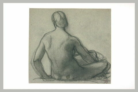 Femme assise à terre, vue de dos