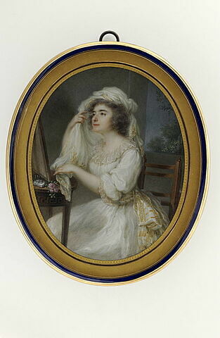 Portrait d'une femme à sa toilette