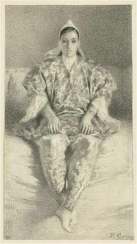 Femme algérienne, de face, assise sur un divan