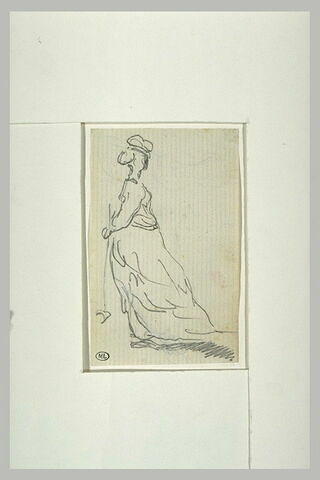 Femme debout, coiffée d'un chapeau, tenant un maillet de croquet, image 2/2