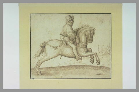 Cavalier au galop se dirigeant vers la droite, image 2/2