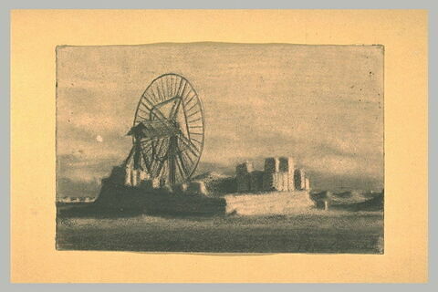 Plate-forme de pierre avec une grande roue au milieu d'un terrain nu, image 2/2