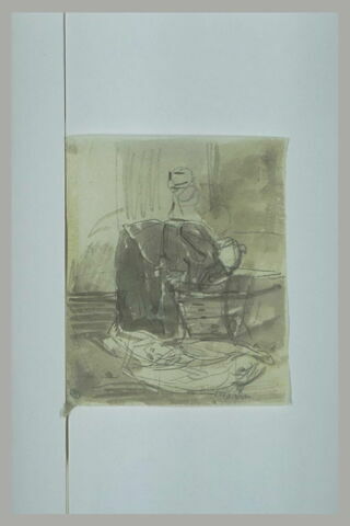 Femme penchée sur un baquet