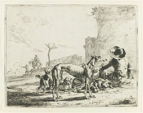 L'homme et ses quatre chiens