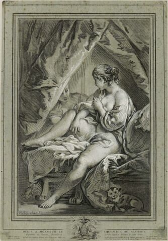 Jeune femme assise sur un lit