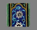Carreau à décor de cartouche à motifs floraux, image 1/2