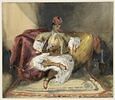 Oriental, assis sur un divan, tenant un narghilé, image 1/2